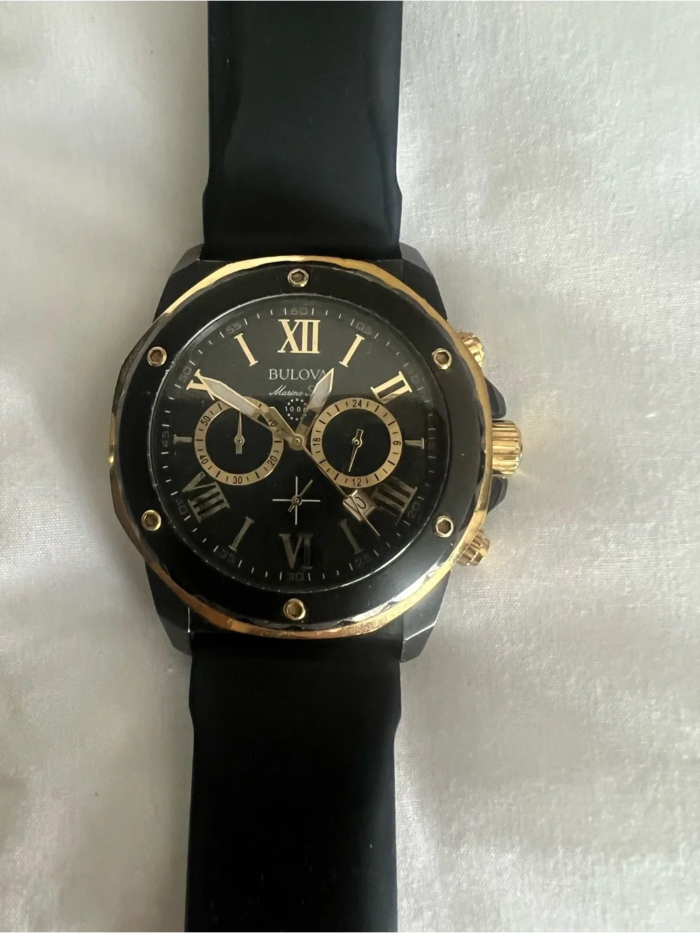 Bulova Black and Gold Men's Chronograph Watch with Roman Numerals